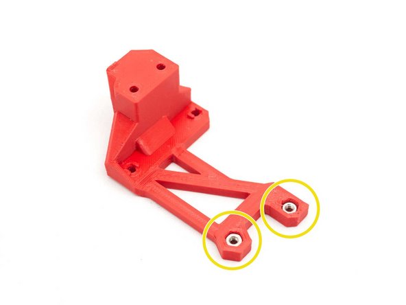 Insert two M3 hex nuts in body_front