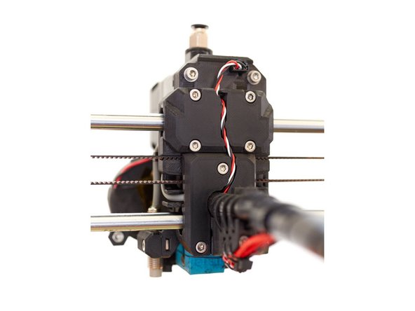 Route the filament sensor cable through the channel in the x_carriage_back.