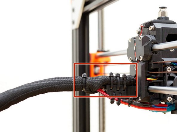 Trim the two bottom zip ties.