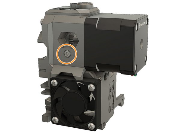 Slide an extruder spring onto a M3x40 screw.