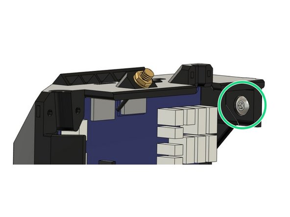 Insert a M5x8mm screw into the pocket on the top of the case. We will use this screw to secure the case to the Z extrusion on the frame.