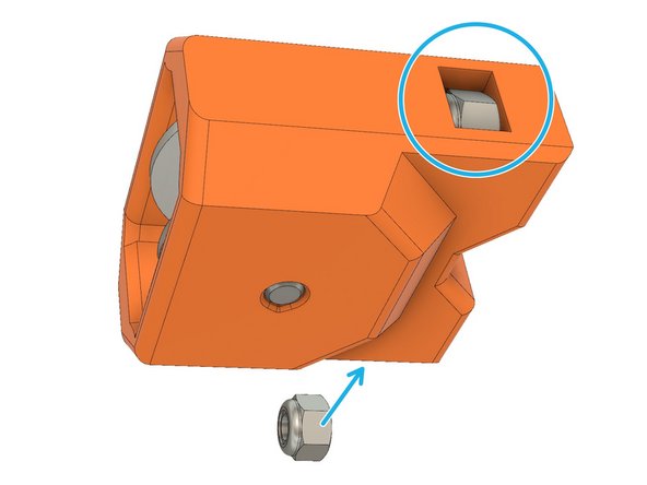 Press the dowel pin through the x_end_idler_tensioner and idler bearings.