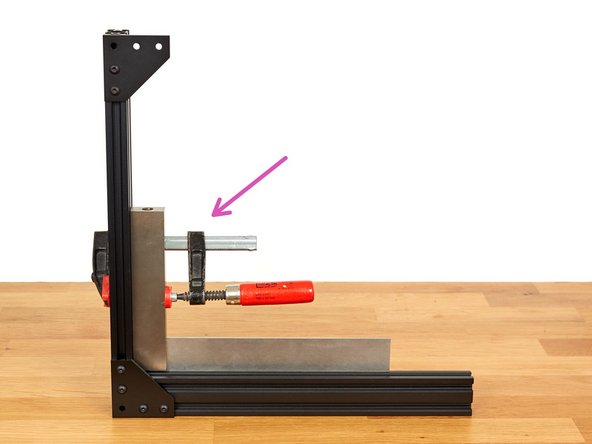 Place the assembly vertically, as shown.