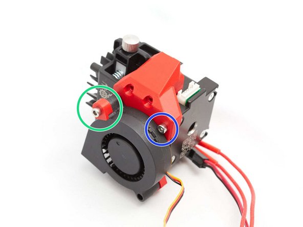 Secure the nozzle fan to the body_front with an M3x25 screw and the printed part nozzle_fan_spacer.