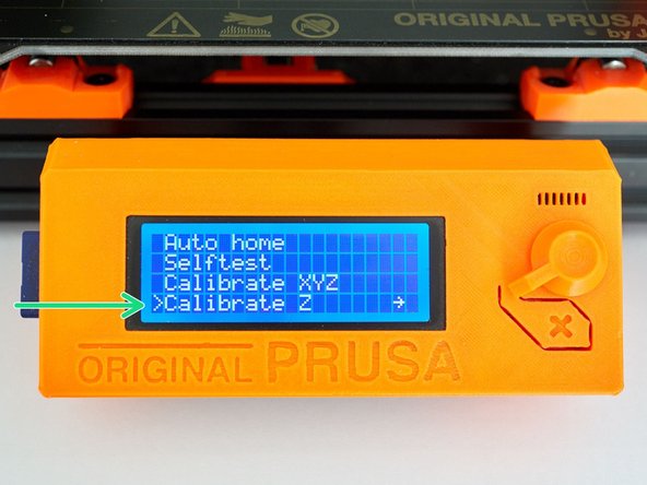 Heat up the nozzle by selecting Settings -&gt; Temperature -&gt; Nozzle: and insert PLA filament.