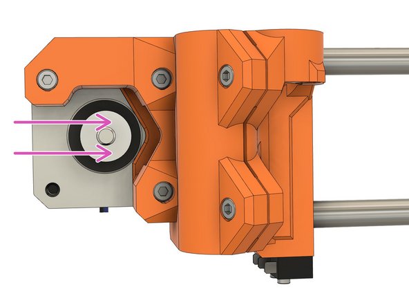 Align one of the set screws on the flat side of the motor shaft and then tighten both set screws alternately until they are snug.