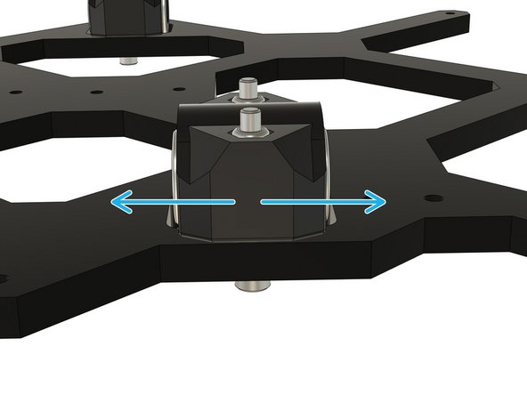 Start tightening, evenly, incrementally and in turn. the M3x25 screws. While tightening, test if the bearing holder can rotate in the directions shown by the red arrows. When it no longer moves, in this direction, stop tightening immediately.
