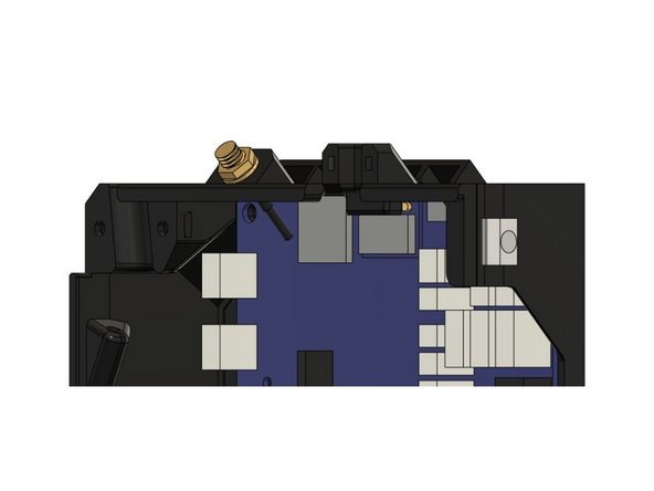 Loosely thread a T-nut onto the screw from the outside of the case. Do not tighten the T-nut to the case, as we will slide the T-nut into the Z extrusion on the frame.