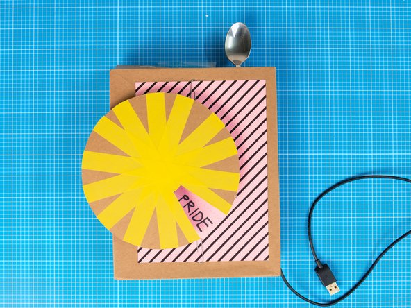 Mount the wheel onto the servo motor, making sure to align the opening and the top-most segment.