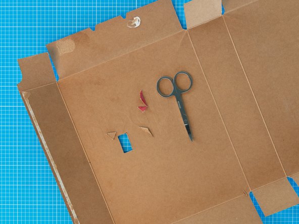 For a sharper cut,  gently score the outline and corners  of the rectangle  with the sharp  tip of scissors before cutting.