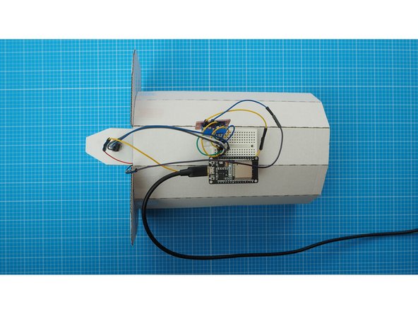 Use the USB cable to power the ESP32s board.