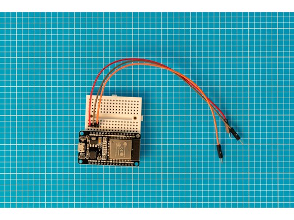 Place three wires on your breadboard as pictured.