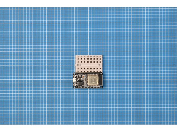 Place one side of the ESP32S onto the other side of the breadboard. The side used should be the same side as the button labelled EN.