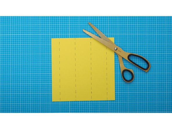 Cut out a piece of coloured paper that is 160mm high and 160mm wide.