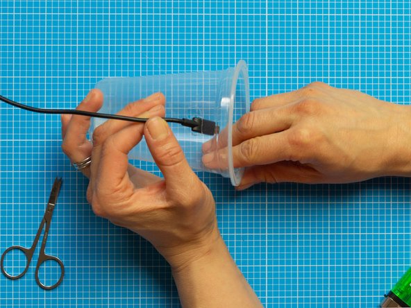 Pierce a small hole in the centre of your mark using a heated screwdriver as described earlier.