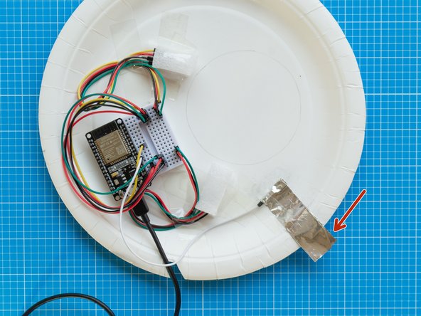 Wrap the connector a couple of times and press it tightly so that it is properly secured to the foil.