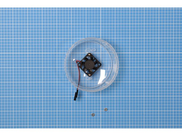 Pass the leads, one by one, through the larger hole that you made in the earlier step.