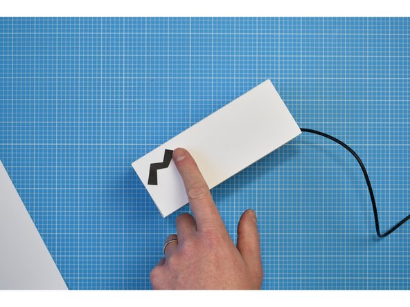 Cut out the 'noise' graphics and stick to the box in any arrangement you wish.