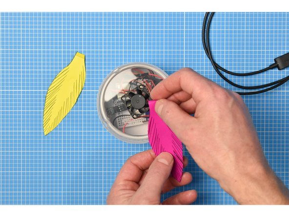 Cut around the feather shapes and roughly cut along each of the printed barbs.