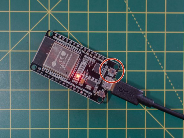 When prompted, hold the BOOT button on your board to set it to &quot;programming mode&quot;. You can let go of the button once you see the text &quot;Writing&quot; in the console text.
