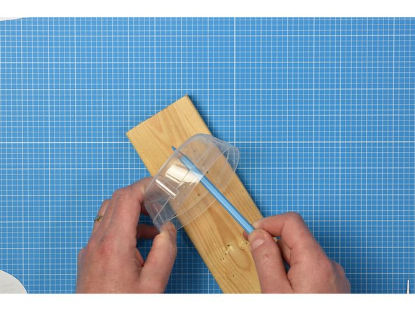 Use a scrap piece of wood or chopping board to protect your work surface during this step.