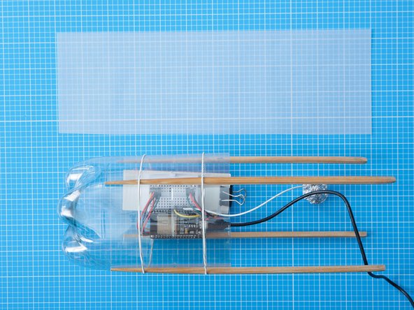 For added diffusion you can add piece of tracing paper inside the bottle covering the area in front of the LEDs. You can use secure it in place using the bulldog clip.