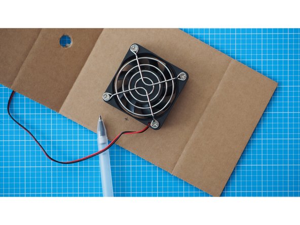 Make a small mark on the side of the fan where the cable is attached.