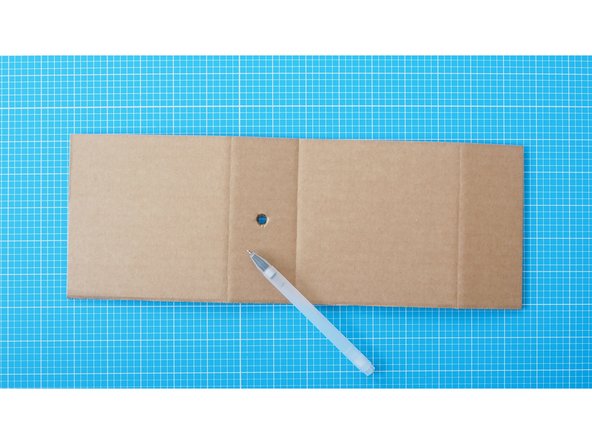 Using a bradawl or other sharp point, carefully make a hole in the centre of the mark.