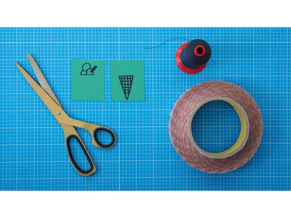 Make a vertical line on the rear of each drawing to divide the paper in two.