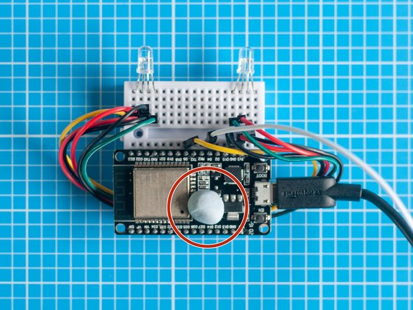 This step is optional, but the red power LED on the ESP32S board can seem quite bright in a darkened space and interfere with the main LED's. Covering this LED with a piece of Blu Tack or tape will eliminate the issue.