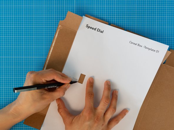 Pick the rectangular panel  that will be the front of the the box. Align the template with the left edge of that face.