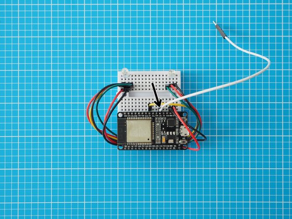 Add the final jumper wire in line with ESP32 pin D4.