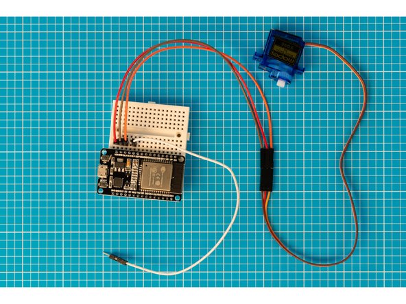 Add the final jumper wire in line with ESP32S pin D14.