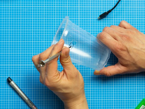 Mark an opening for the USB lead. This should be placed on the back side of your device, opposite to the PIR sensor which will be on the front.