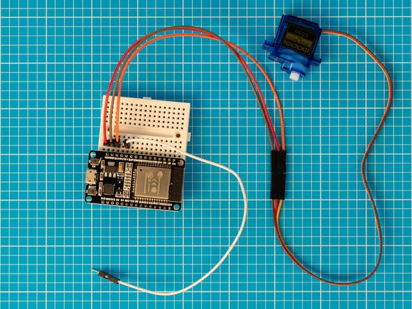 Add the final jumper wire in line with ESP32S pin D14.