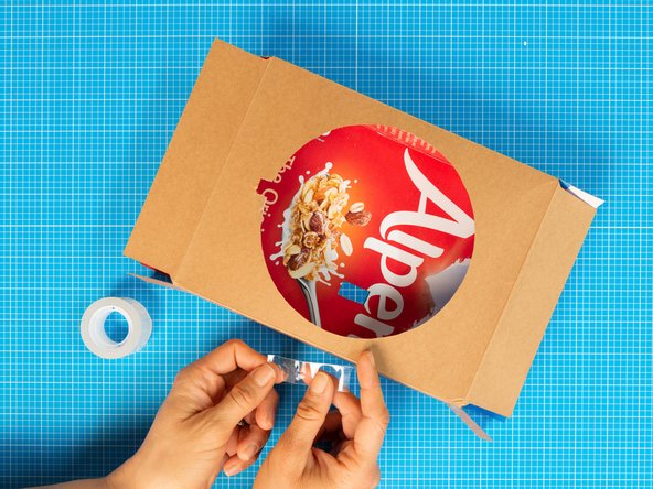 Fold the box back into its original shape and fix the flaps with tape or glue.