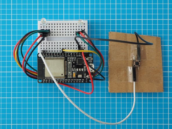 An external Button can be used instead of capacitive touch by adding a switch between pin D23 and GND on the ESP32.