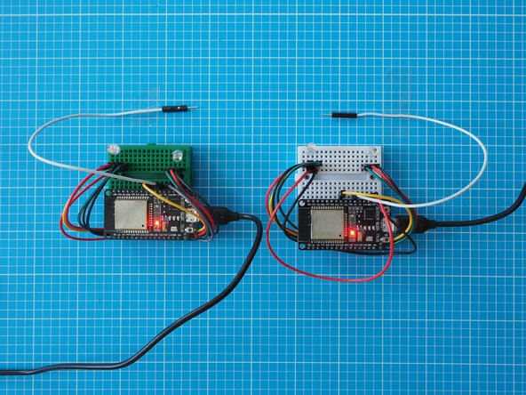 Press and hold the capacitive touch lead (white) on one Light Touch device to scroll through different colours. Let go to select a colour.