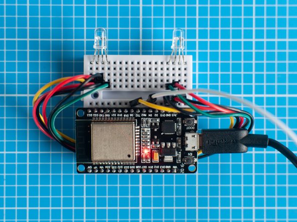 This step is optional, but the red power LED on the ESP32S board can seem quite bright in a darkened space and interfere with the main LED's. Covering this LED with a piece of Blu Tack or tape will eliminate the issue.