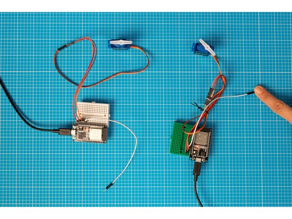 Tap on either device's capacitive touch lead to advance both servo motor positions. Make sure to test them both.
