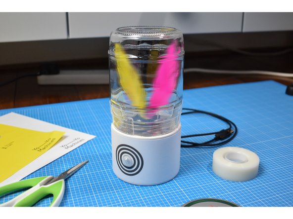 If the motion seems slow or laboured, you may need to adjust the centering of the feathers on the fan, or you may need to trim them to better fit inside the jar.