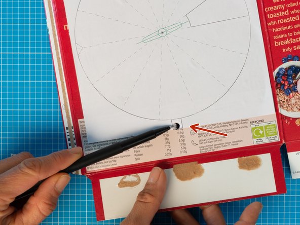 Roughly cut template no. 2 and glue it on panel that will be the back of you box (opposite to the panel with the rectangular cut).  The circle should be roughly in the center with the square towards the bottom.