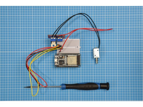 Put the leads from the solenoid into the V+ and V- screw terminals of the MOSFET module. Most solenoids are supplied with two black leads as shown in the photograph, so it does not matter which way around they are placed.