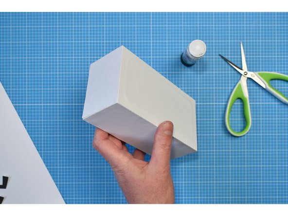 Cut out and stick the target graphic to the lid of the box using a glue stick.