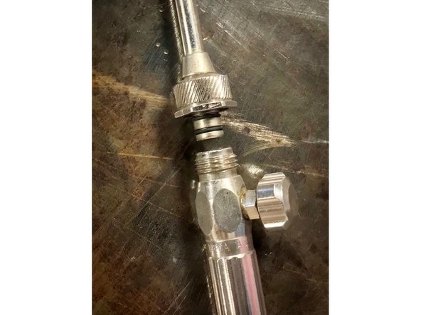 Ensure torch tip holes are open and uncovered before proceeding.