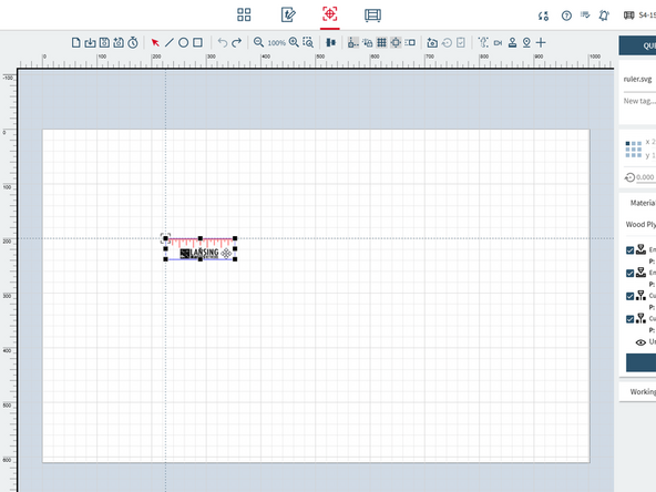 You will see your design on a white grid. There will be a black crosshair somewhere on that field.