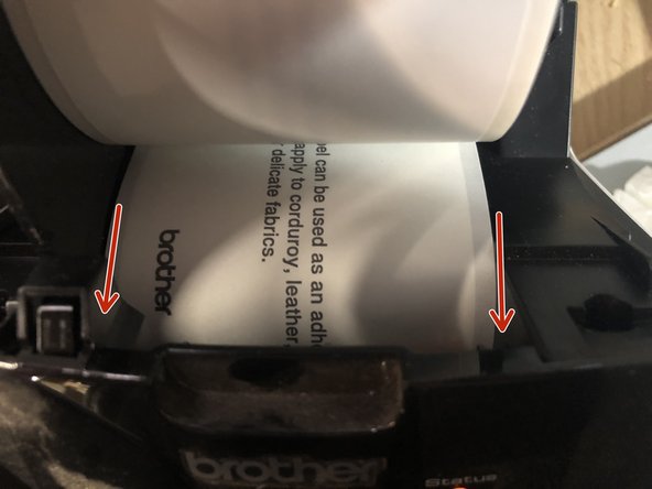 Feed the front of the label roll into the printer.