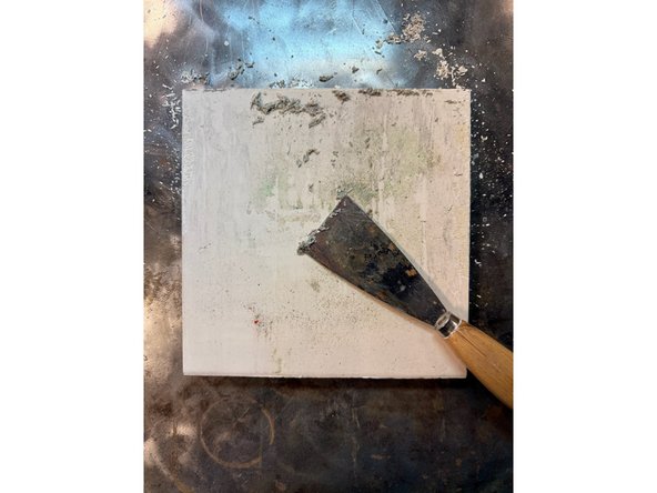 CAUTION: Hazard. Kiln wash is a fine, silica powder. Protect your lungs by wearing a dust mask while scooping kiln wash out of the container it comes in.
