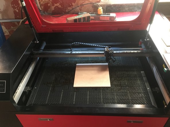 Open the lid and remove your material