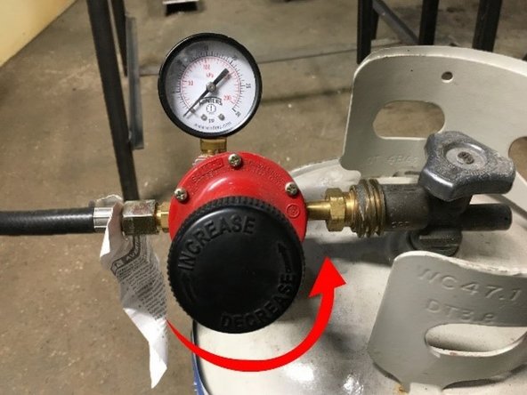 Turn Propane Regulator knob counterclockwise until Regulator Gauge reads 5 psi. If you are working large material, you may wish to run the forge at a higher psi (up to 10 psi). Be aware that at higher psi the forge will use significantly more fuel. Please do not be wasteful!